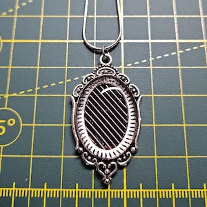Handmade circuit board necklace made with real recycled circuit board, on a sterling silver chain.