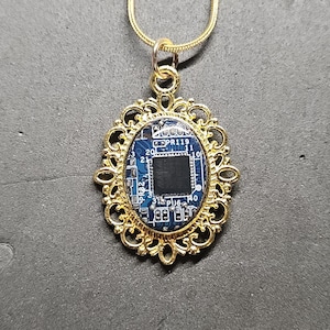 Handmade circuit board necklace made from real recycled circuit board.