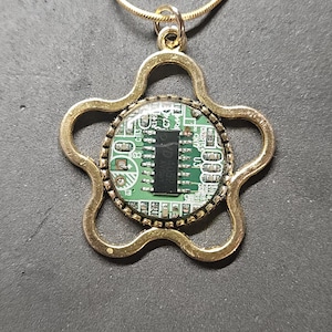 Handmade circuit board necklace made from real recycled circuit board.