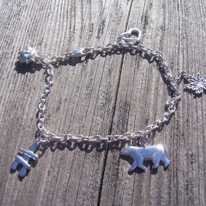Sterling silver I love Canada charm bracelet, maple leaf polar bear inukshuk silver bracelet, Canadian themed jewelry