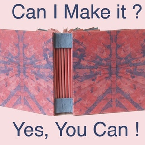 Puede incluir: Un libro hecho a mano con una cubierta de mármol rosa y azul. El libro está cerrado y la encuadernación es visible. El texto "Can I Make it? Yes, You Can!" está impreso en la imagen.
