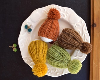 Knitted egg cozy pompom egg hats set of 4 yellow brown green Easter Thanksgiving Christmas table decor handmade gift under 25 photo prop
