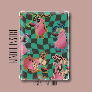 May include: A rectangular Kindle insert featuring a repeating pattern of a pink cartoon dog with large eyes and expressive faces against a wavy black and teal checkered background. The text "KINDLE INSERT" and "CASE NOT INCLUDED" is visible.