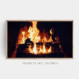 May include: A close-up of a fireplace with a roaring fire. The flames are orange and yellow, and the logs are burning brightly. The fireplace is surrounded by dark brick.