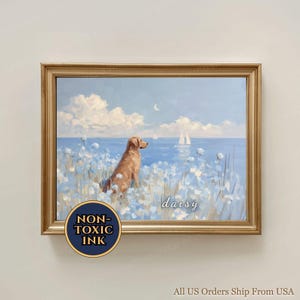 May include: A framed art print depicting a golden retriever in a field of blue flowers, overlooking the sea with sailboats. The painting is in a gold frame, with the name "daisy" on the artwork. A "NON-TOXIC INK" sticker is in the lower left corner.