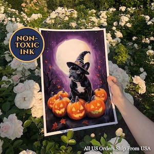 May include: A rectangular art print featuring a black French Bulldog wearing a pointed witch hat, sitting among several glowing orange jack-o'-lanterns against a purple night sky with a large full moon. The print includes the text NON-TOXIC INK.