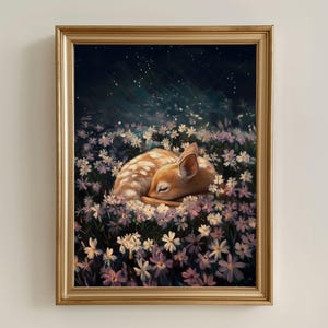 May include: A framed art print depicting a sleeping fawn in a field of white and purple flowers. The fawn has brown fur with white spots. The background is dark blue with a grid and small white dots.