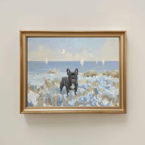 May include: A framed painting of a black French Bulldog standing in a field of light blue flowers. In the background, a calm sea features several white sailboats under a pale sky with a crescent moon. The name Apollo is written in white script.