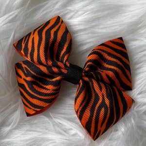 Tiger hair bow, orange and black striped hair clip, jungle party accessories, safari birthday, animal print hair barrette, cute bows