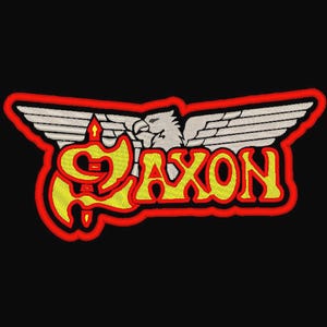 May include: A red, white, and yellow embroidered patch with the word "SAXON" and an eagle with outstretched wings.