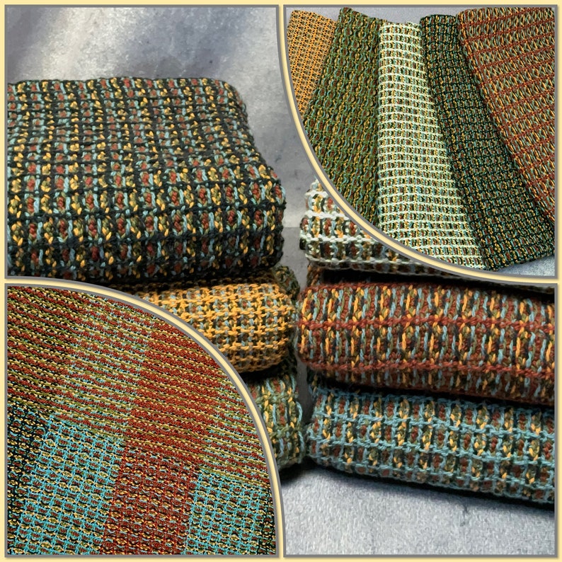 May include: A stack of woven kitchen towels in various colors, including green, blue, brown, and yellow. The towels are made of a soft, textured fabric and have a subtle pattern.
