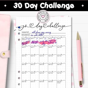 May include: A printable PDF journal page with a 30-day challenge layout. The page includes a title, terms, and reward sections, along with spaces to track daily progress. A pink pen and a pink planner are visible.