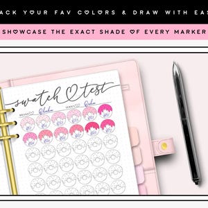 May include: A pink and white planner with a gold binder ring. The planner has a page with a donut-shaped swatch chart for tracking colours. The page is labelled "swatch test" and "Ohubu" with a heart symbol.