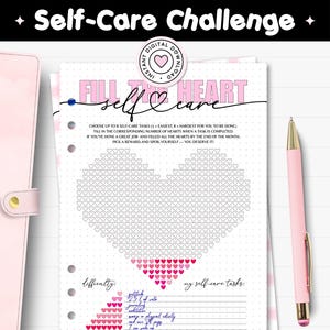 May include: A pink and white self-care journal page with a heart-shaped tracker. The page includes the text "Self-Care Challenge" and "Fill the Heart". A pink pen rests on the right side. The journal is designed for self-care tasks.