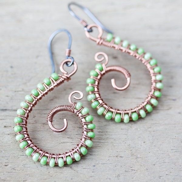 Pastel Green Earrings, Beaded pure copper spiral earrings, dangle, swirls, wire wrap, light green seed beads - handmade copper jewelry