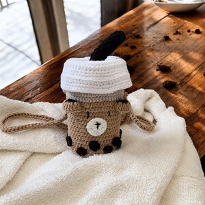 Süße Milch Teebeutel - Handgemachte Wolle gestrickte Geldbörse, trendiges Häkelpuppen Design, stylische Schulter & Umhängetasche für Frauen