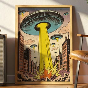 May include: A framed pop art print showing a city being attacked by UFOs. The artwork features a large blue and yellow spacecraft beaming a yellow ray onto the city, with smaller UFOs in the sky. The buildings are in shades of brown and tan.