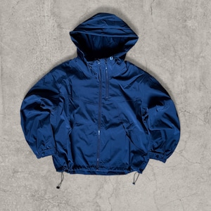 May include: A navy blue hooded jacket with a full-length zipper and drawstrings at the hem. The jacket has a hood and two side pockets. The jacket is made of a lightweight material.