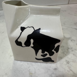 Ceramic milk carton with Holstein cow design