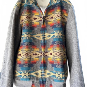 May include: A handmade wooden sign with the text "Welcome" in a playful font. The sign features a distressed white background and a dark brown border, perfect for a front door or entryway. The sign measures approximately 12 inches wide and 6 inches tall.