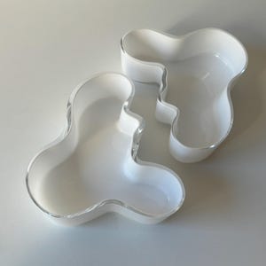 Glass bowls by Finnish company Iittala, design by Alvar Aalto