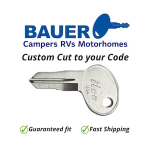 May include: A silver key with the text "Elco USA" is displayed. The key is for RVs, campers, and motorhomes. The text "Custom Cut to your Code" is above the key. The logo for Bauer is at the top.