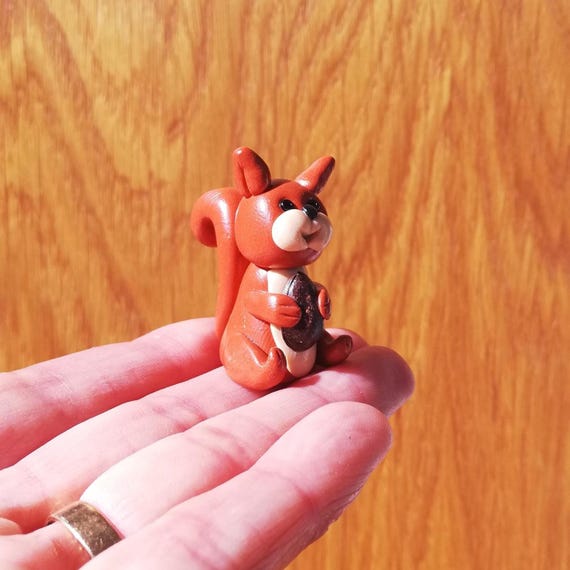 Scottish Red Squirrel Figurine: Handmade Polymer Clay Miniature with Pine Nut