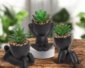 Maceta negra con forma de figura: maceta minimalista de resina para suculentas, ideal para decoración de interiores y exteriores.