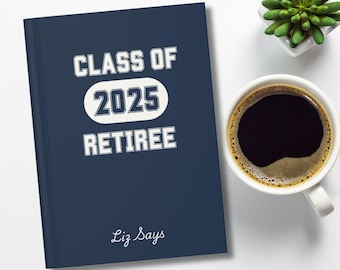 May include: A dark blue notebook with white text that reads "Class of 2025 Retiree" and "Liz Says".