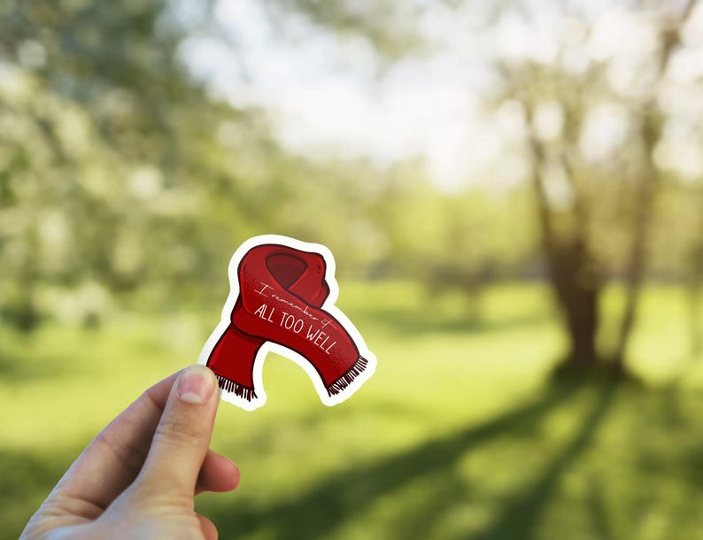 May include: Red scarf sticker with the text "I remember it all too well" on a white background.