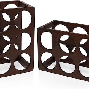 May include: Two wooden wine racks, one tall and one short, both in a dark brown finish. Each rack features circular cutouts for holding wine bottles. The design is modern and minimalist, suitable for home decor.