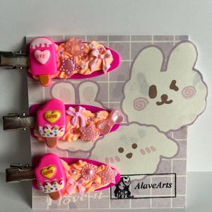 Pink decoden hair clips