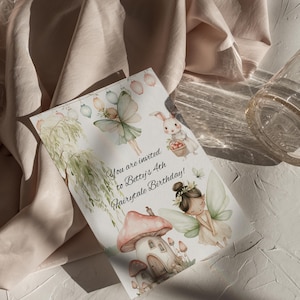 May include: A whimsical invitation card with a watercolor illustration of fairies, a mushroom house, and a bunny rabbit. The text reads "You are invited to Betty's 4th Fairytale Birthday!"