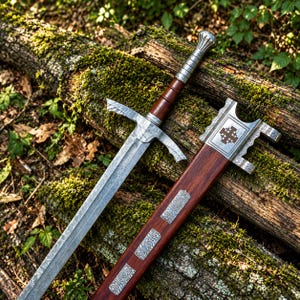 May include: A double-edged steel sword with a dark brown wooden grip and a metallic pommel. The matching scabbard features a dark brown wooden body, silver-toned metal accents, and a prominent Jerusalem cross emblem engraved on the top fitting.