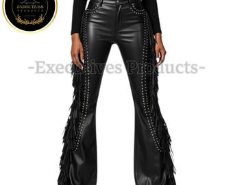 May include: Black leather pants with fringe detailing along the sides and studded accents. The pants have a flared leg and a high waist. The image also includes a logo in a gold circle.