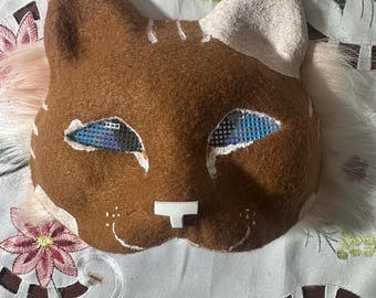 brown cat therian mask!