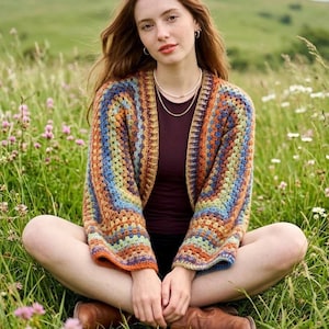 May include: A set of three ceramic mugs with a speckled, matte finish in cream, light grey, and dark grey. Each mug has a simple, minimalist design, suitable for coffee or tea.