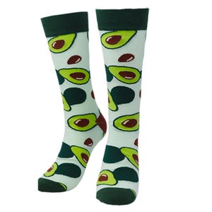May include: A pair of knee-high socks with a light green background and a repeating pattern of avocados. The avocados are green with brown pits and dark green accents. The top and toe of the socks are dark green.