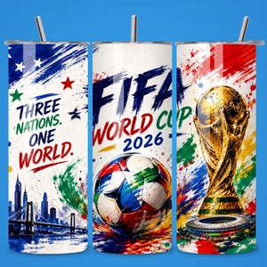 May include: A cylindrical tumbler with a straw featuring a FIFA World Cup 2026 design. The graphic includes a soccer ball, the gold trophy, a city skyline with a bridge, and the text Three Nations. One World. FIFA World Cup 2026 in colorful paint splatters.