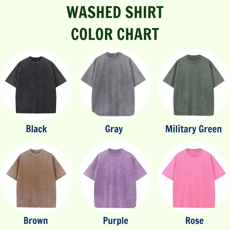 Puede incluir: Una carta de colores que muestra seis camisetas lavadas en varios colores: negro, gris, verde militar, marr&oacute;n, morado y rosa. El texto "WASHED SHIRT COLOR CHART" est&aacute; en la parte superior, con cada color etiquetado debajo.