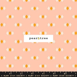 May include: A peach-colored fabric with a repeating pattern of white and yellow diamonds. The fabric is labeled "pear tree" and "Ruby Star Society".
