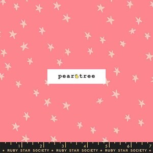 May include: Pink fabric with a scattered star pattern. The stars are a light beige color. The text "pear tree" is in a white rectangle. The bottom of the fabric has a ruler with the text "RUBY STAR SOCIETY".