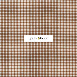 May include: Brown and white gingham pattern fabric. The fabric has a classic checkered design with evenly spaced squares. The text "pear tree" is displayed on a white rectangular label, with a small pear graphic.