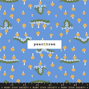May include: Blue fabric with a repeating pattern of orange and white mushrooms and green caterpillars. The text "pear tree" is in a white rectangle. The bottom of the fabric has a ruler and the text "RUBY STAR SOCIETY".