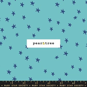 May include: A turquoise blue fabric with a repeating pattern of navy blue stars of varying sizes. The fabric has the text "pear tree" printed in white on a white rectangle.