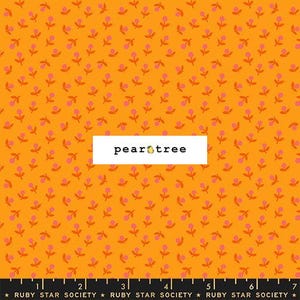 May include: A vibrant orange fabric featuring a repeating pattern of small pink flowers with orange stems and leaves. A white rectangular label in the center displays the text pear tree with a small pear icon. A black ruler is visible at the bottom.