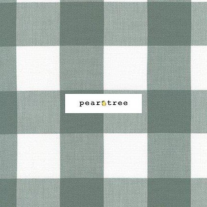 May include: A close-up of a fabric with a large checkered pattern in white and sage green. The text "pear tree" is displayed in a white rectangle.