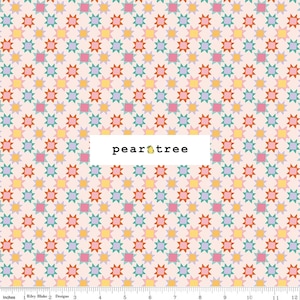May include: A fabric with a repeating pattern of colorful starbursts in shades of pink, orange, yellow, blue, and green on a light pink background. The text "pear tree" is displayed in a white rectangle.