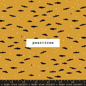 May include: A yellow fabric with a repeating pattern of black bats and white stars. The text "pear tree" is printed in the center of the fabric.