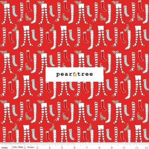 May include: Red fabric with a repeating pattern of legs in white shorts and striped stockings, along with light blue socks and sprigs of holly. The text "pear tree" is in a white rectangle.